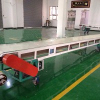 平板输送机可以帮助生产商运送物料